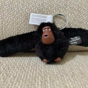 FREE with a bundle (two more items). Kipling monkey keychain.